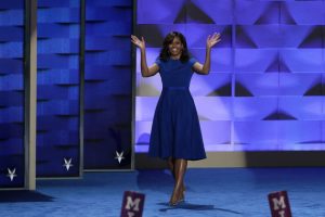 PHILADELPHIA, PA - JULY 25: First lady Michelle Obama walks on stage to deliver remarks on the first day of the Democratic National Convention at the Wells Fargo Center, July 25, 2016 in Philadelphia, Pennsylvania. An estimated 50,000 people are expected in Philadelphia, including hundreds of protesters and members of the media. The four-day Democratic National Convention kicked off July 25. (Photo by Alex Wong/Getty Images)